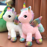 Giant Fantastic Unicorn Plush toy Rainbow Glowing Wings Stuffed Unicorn - Tania's Online Closet, LLC